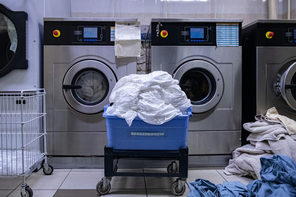Industrial laundry machines with clean linens